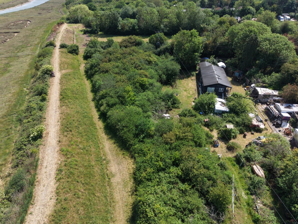 Lot: 82 - 0.88 ACRE FREEHOLD PARCEL OF LAND - 3rd aerial overview of overgrown land